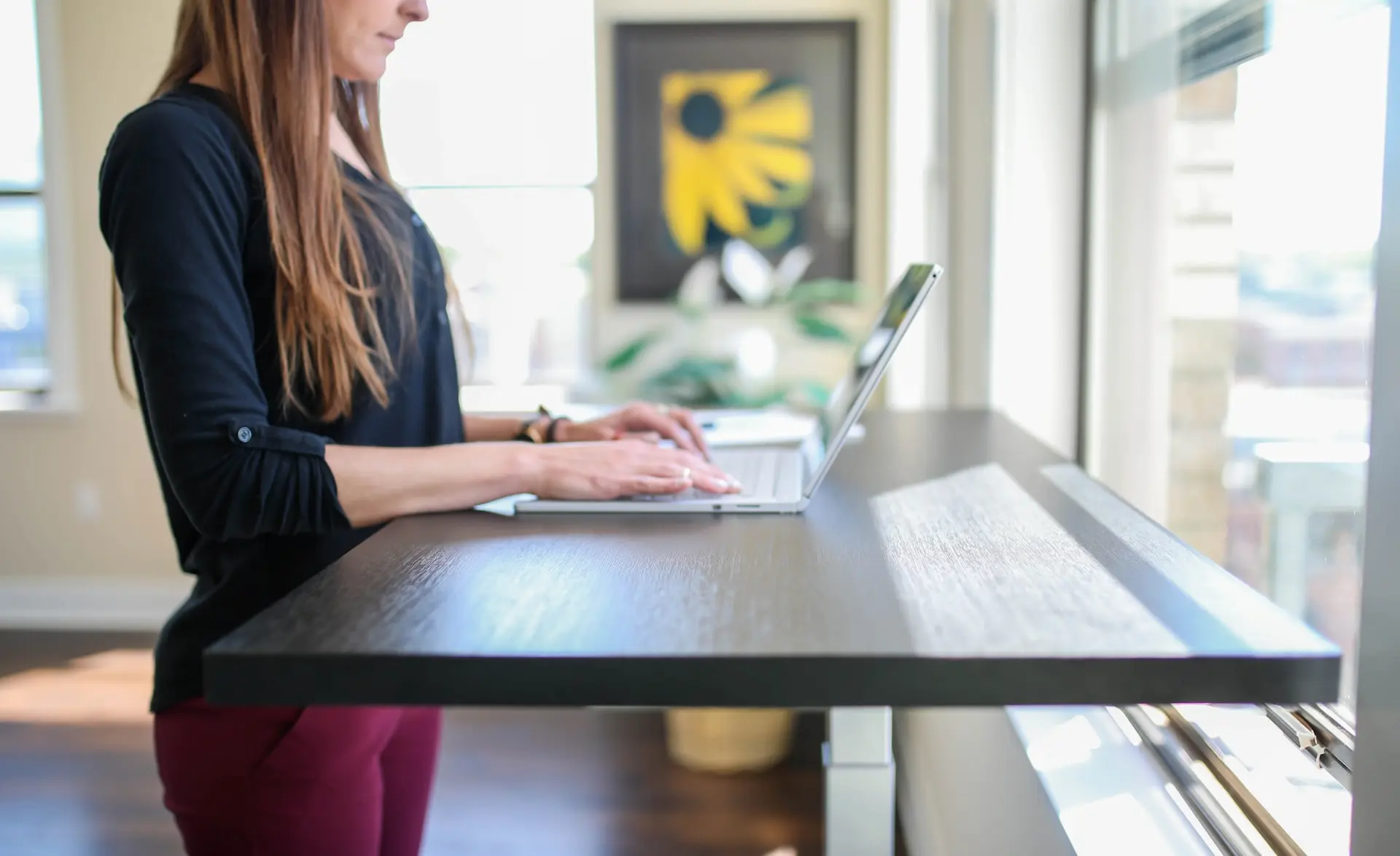 Women working on a standing desk