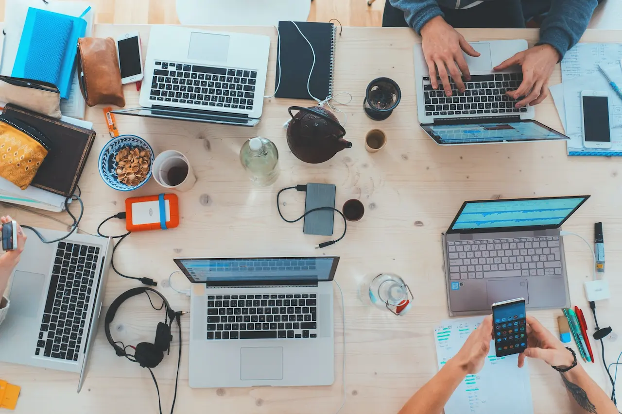 Tools and technolgy on a desk.