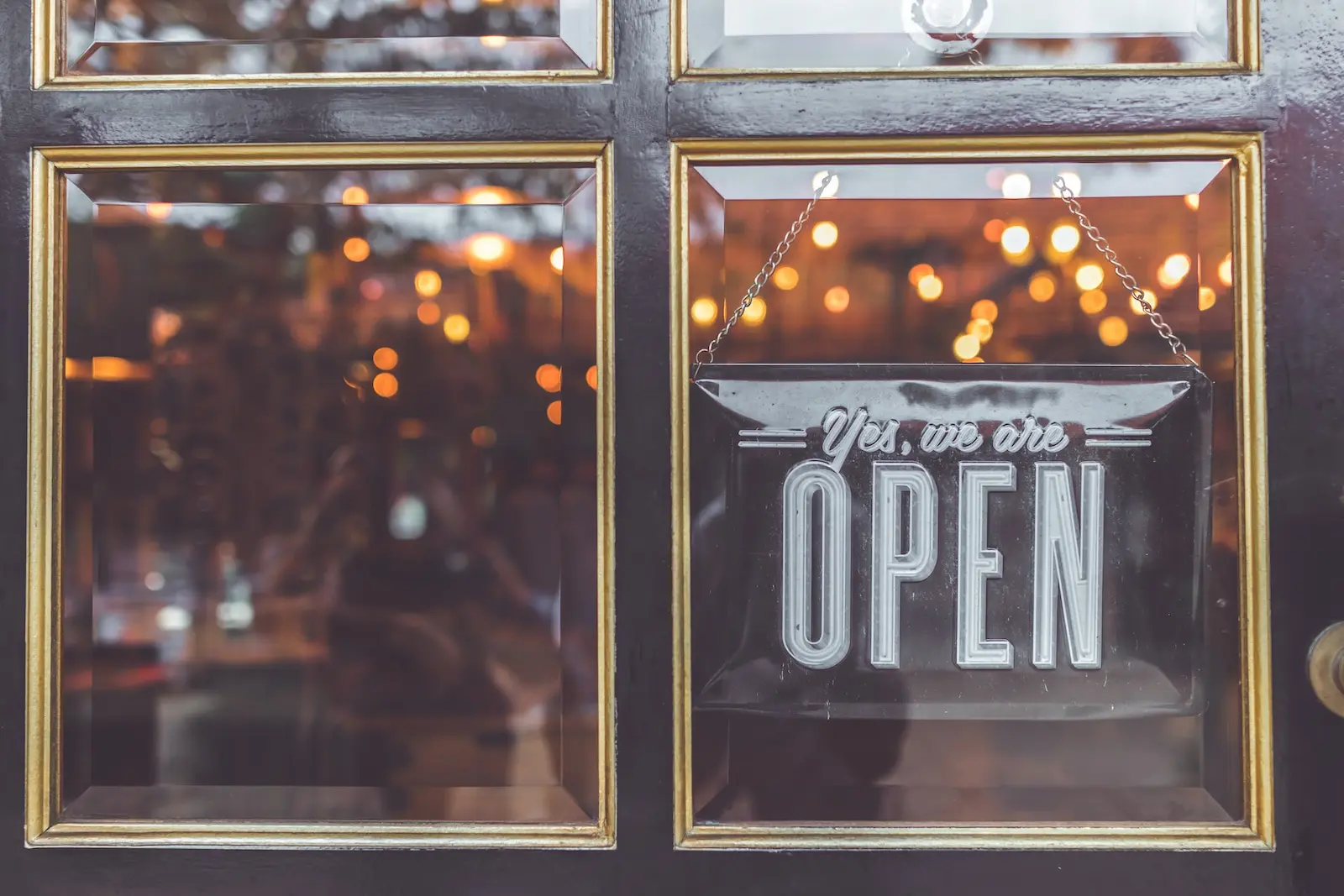 Business sign saying we are open