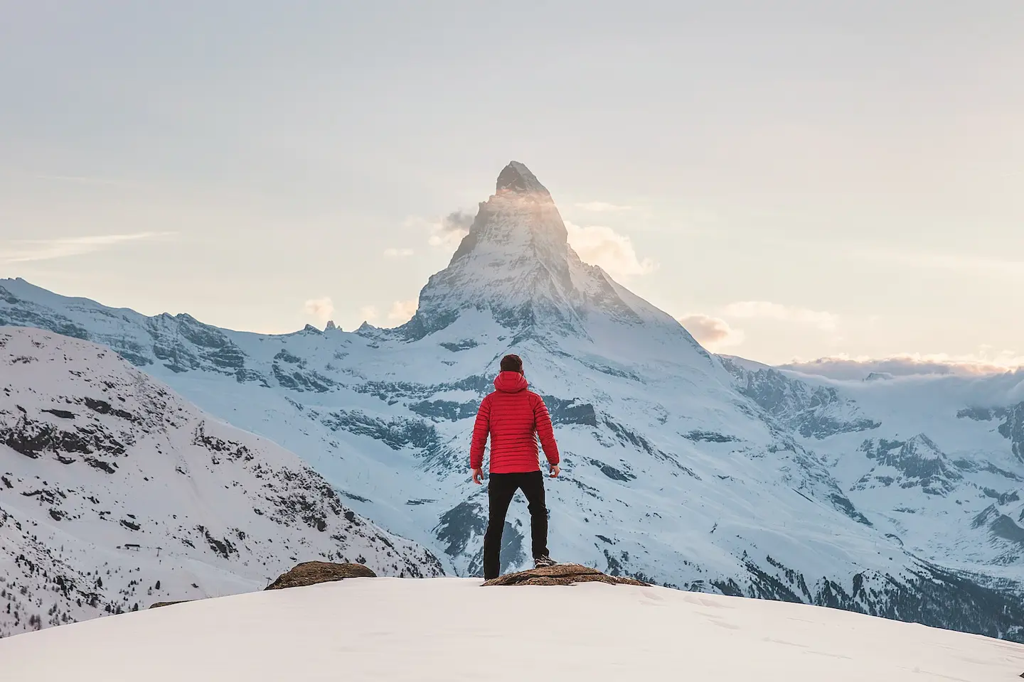 Someone scaling a mountain